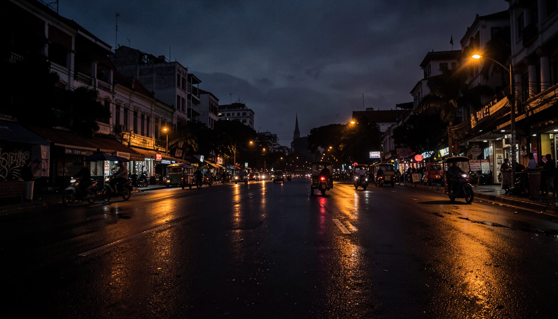 A moody twilight cityscape of Surabaya with warm amber streetlights reflecting off wet asphalt, silhouettes of becak and scooters moving through the evening haze